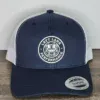 Left Lane Performance white design on Navy and White YP Classics trucker style hat close view