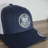 Left Lane pitbull design on a Navy and White YP Classics trucker style hat